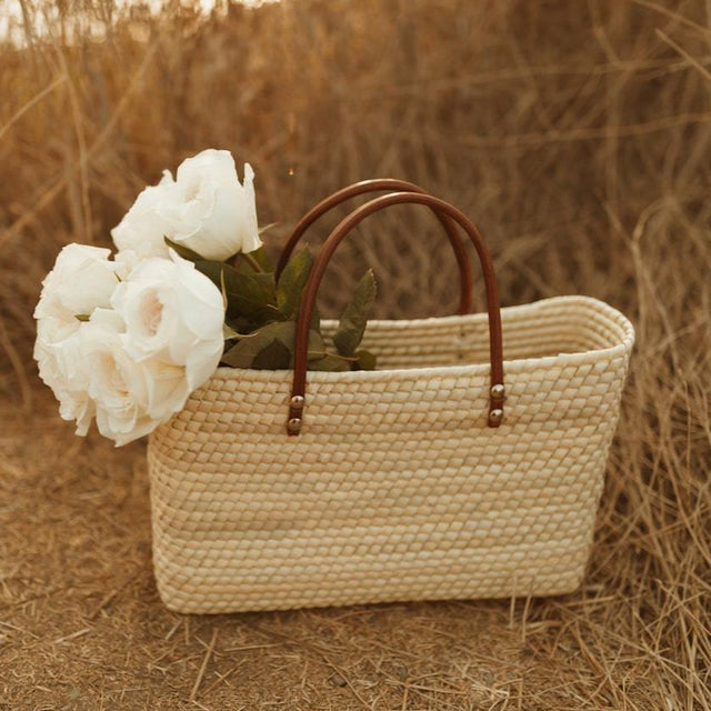 The Juniper, our best selling woven straw tote bag by Leah