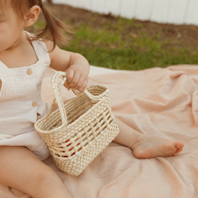Small straw bags and mini baskets by Leah