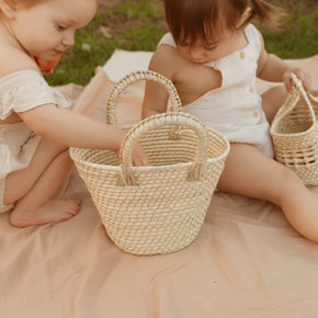 Small straw handbags, baskets and accessories by Leah