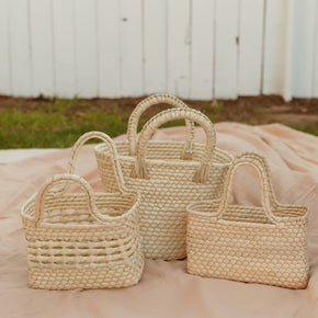California inspired mini straw baskets designed by Leah, sustainably handmade by artisans