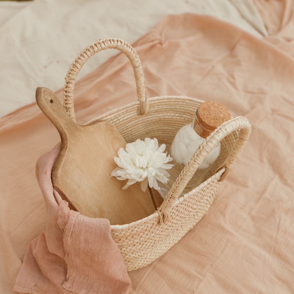 Classic straw basket bags sustainably made by artisans